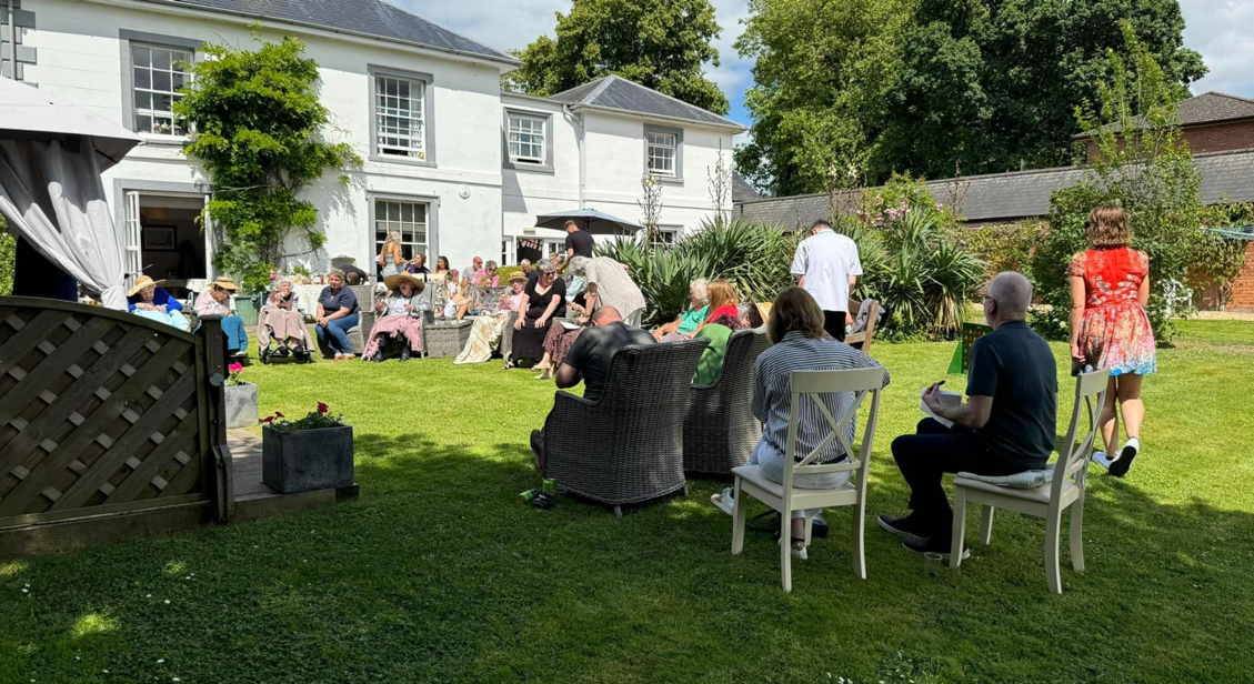 People sat in the garden